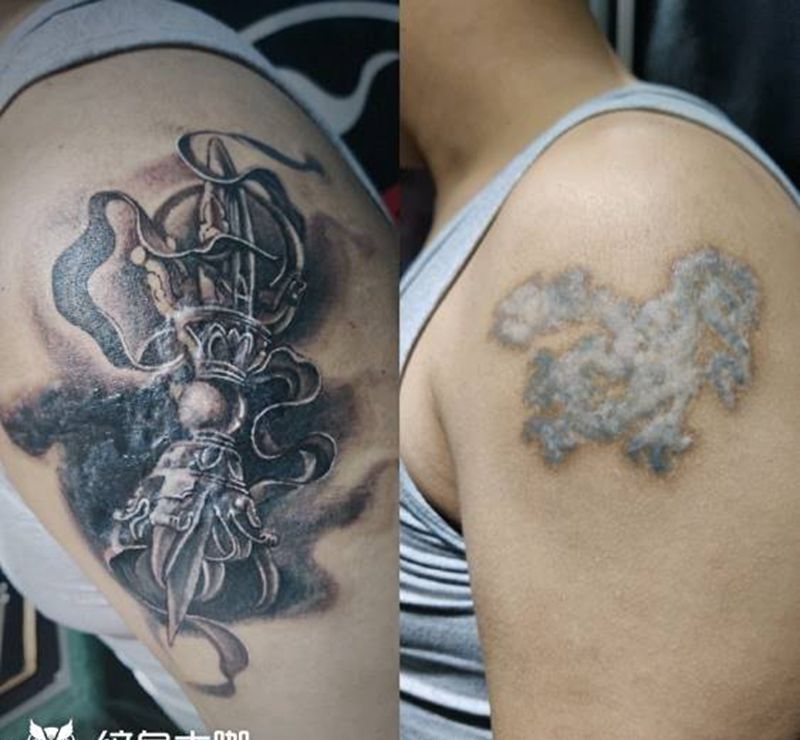 降魔杵纹身图片_手臂遮盖纹身图案
