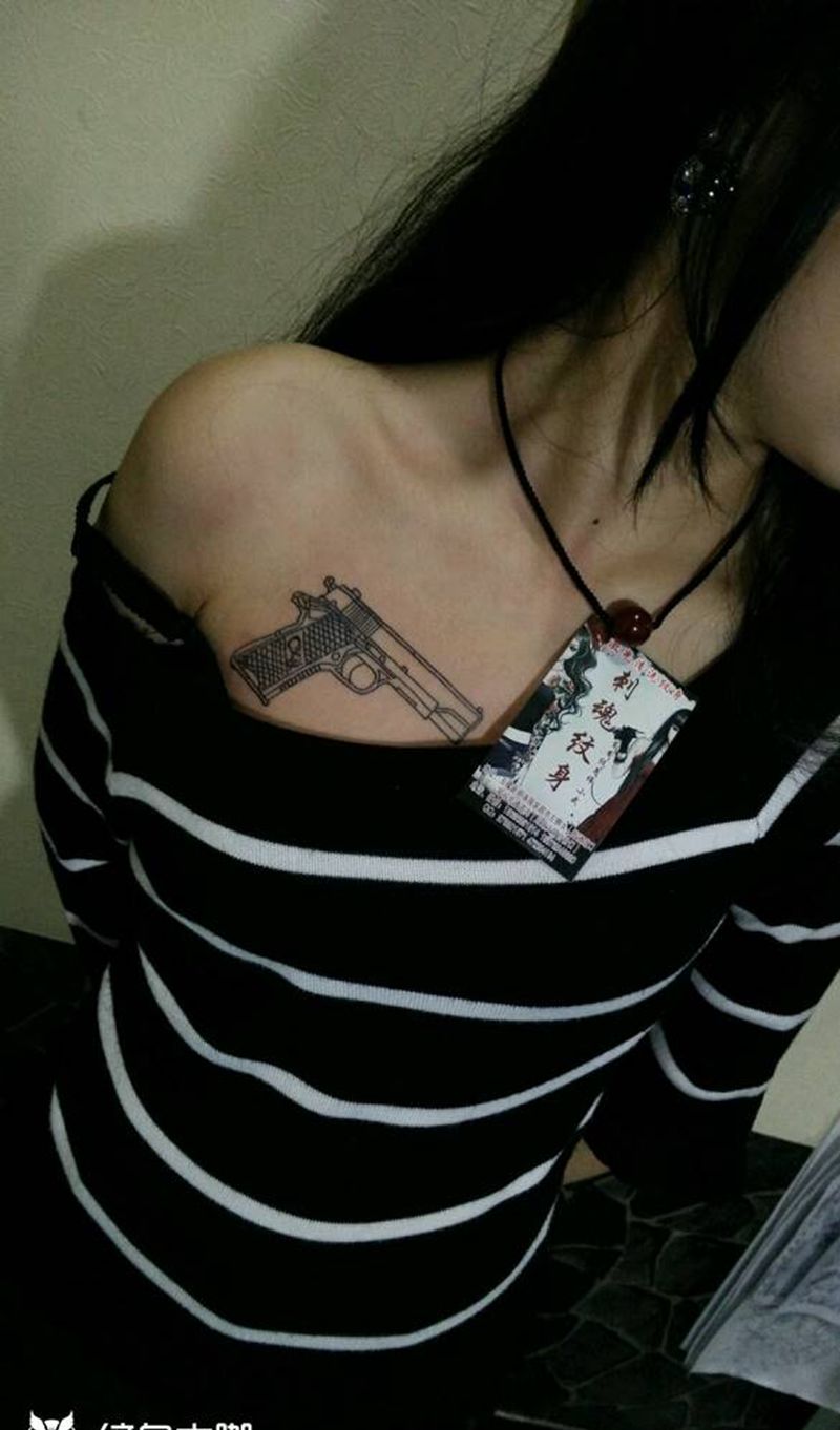 枪纹身图片