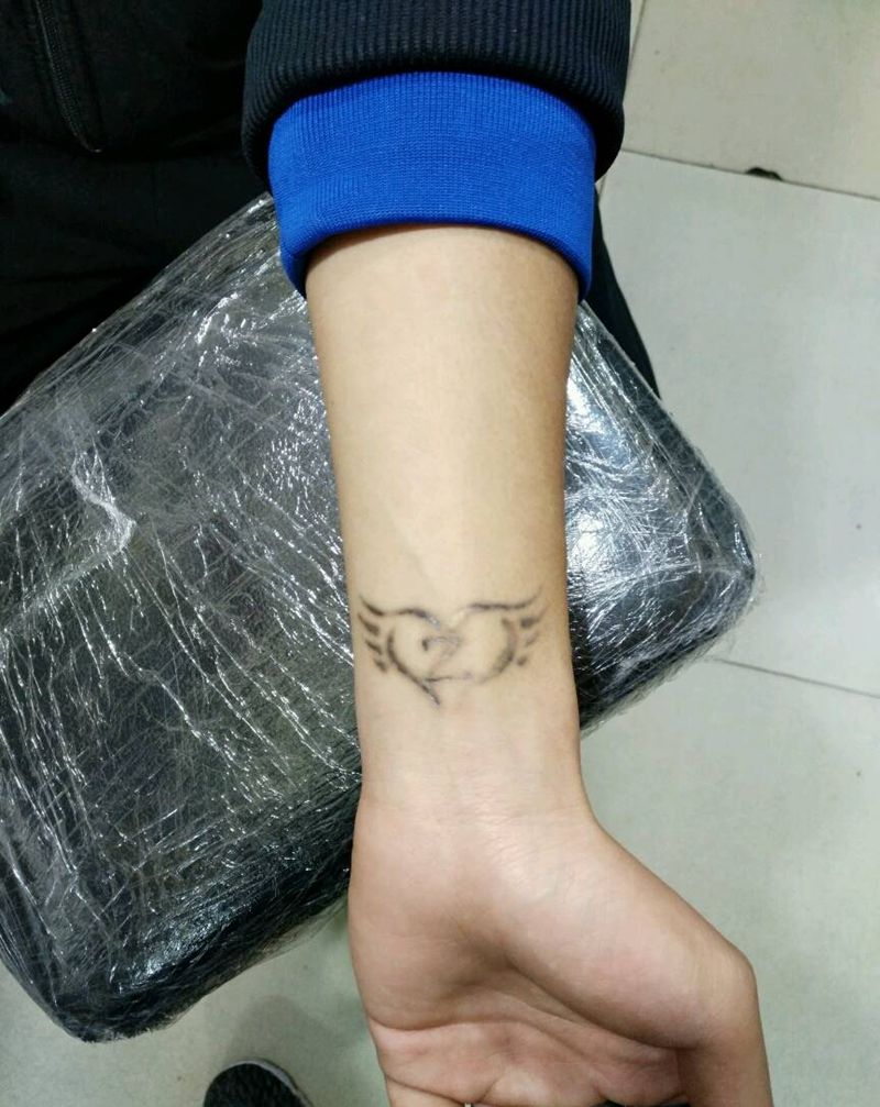 旧纹身清洗纹身图片_手臂传统图腾原创花絮生活成品纹身图案