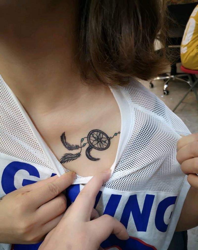 扑梦网纹身图片_胸部几何纹身图案