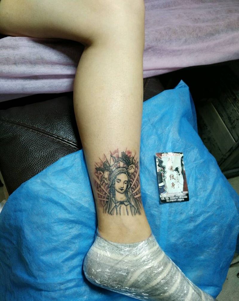 圣母，光环背景纹身图片_腿部欧美肖像写实宗教原创花絮生活成品纹身图案