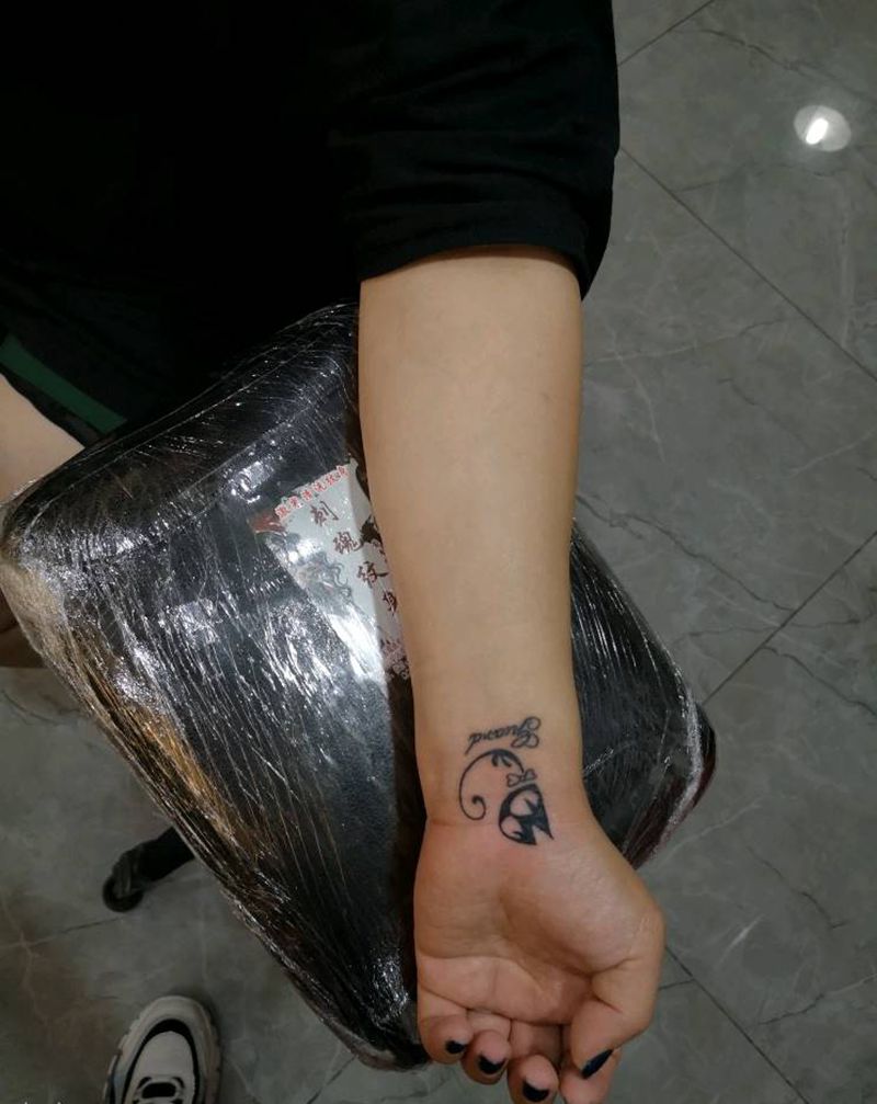 小猫纹身图片_手臂老传统纹身图案