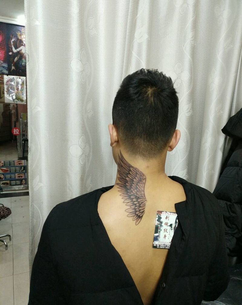 翅膀纹身图片_颈部传统清新宗教原创花絮生活成品纹身图案