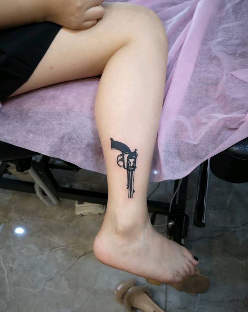 小手枪纹身图片_腿部图腾纹身图案
