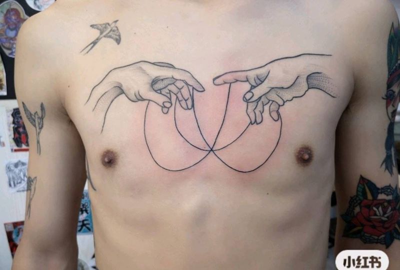 线纹身图片_胸部几何纹身图案