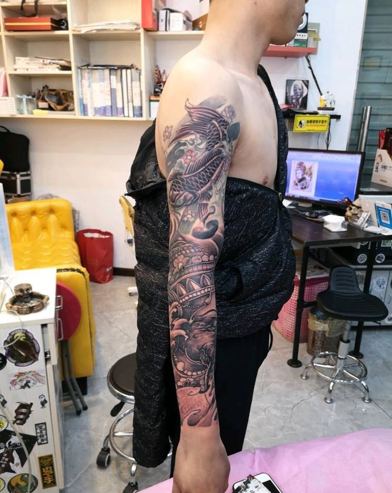 半成品象神纹身图片_手臂新传统纹身图案