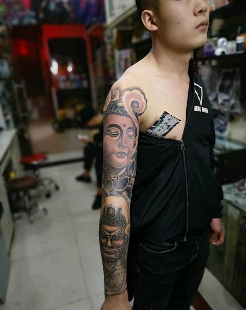 佛与不动明王大花臂纹身图片