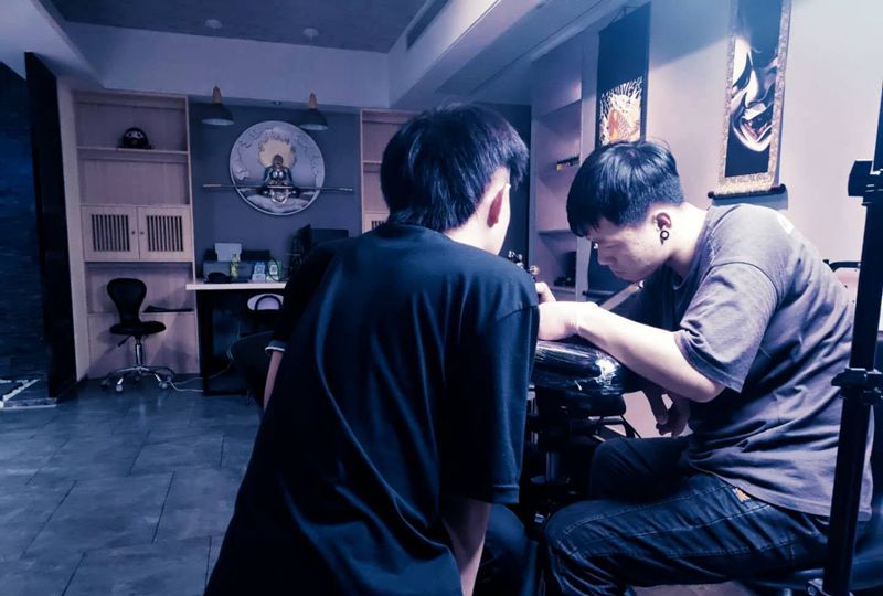 谭刺青新工作室纹身图片_手臂新传统纹身图案