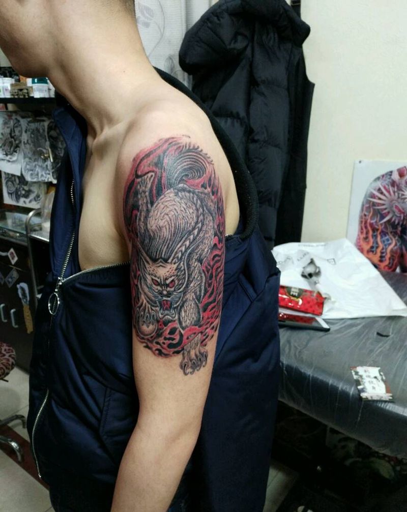 烈火麒麟纹身图片_手臂传统动物原创花絮生活成品纹身图案