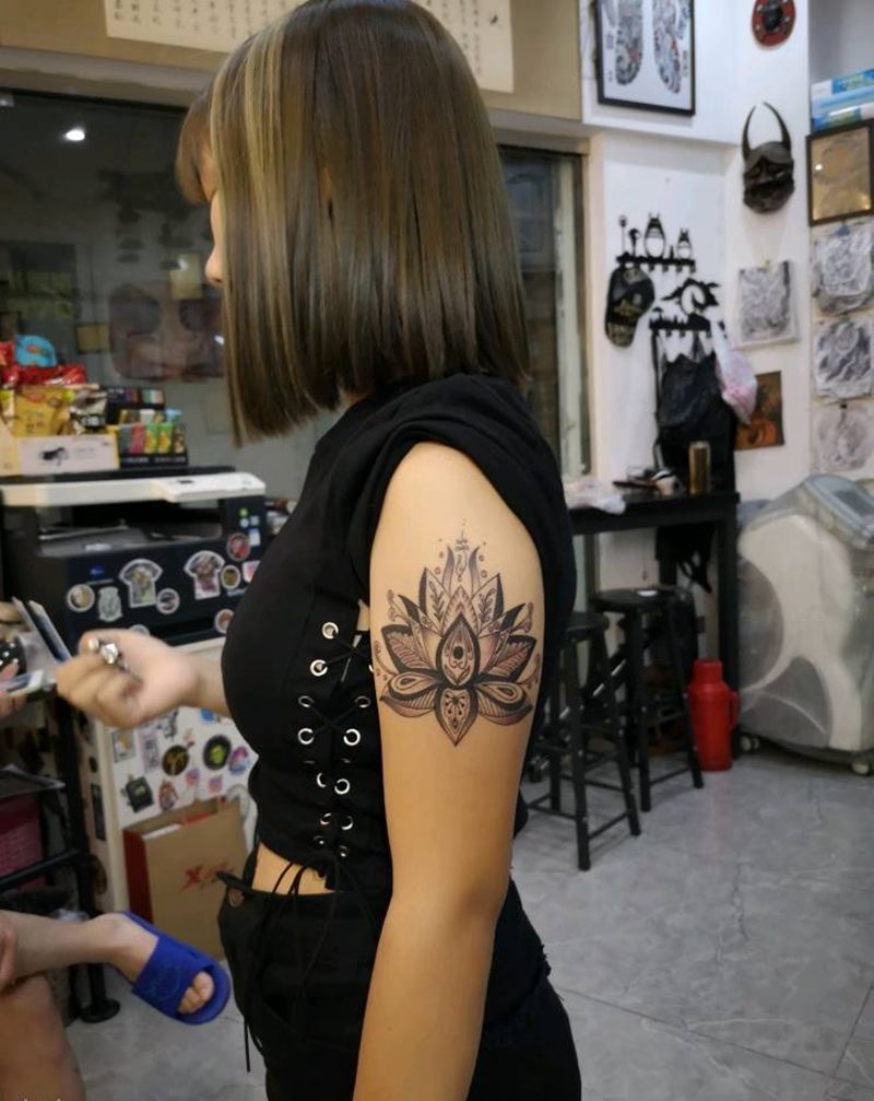 大臂繁花纹身图片_手臂图腾纹身图案