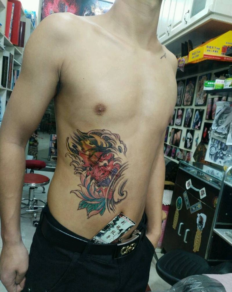 遮盖疤痕，般喏纹身图片_腰部传统原创花絮生活成品纹身图案