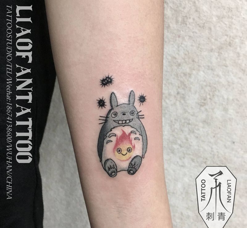 龙猫纹身图片_手臂Old SchoolNew School卡通纹身图案