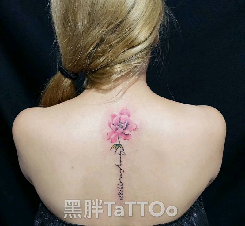 后背花纹身图片