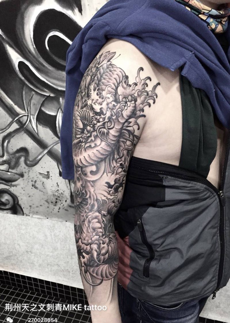 9分龙花臂纹身图片