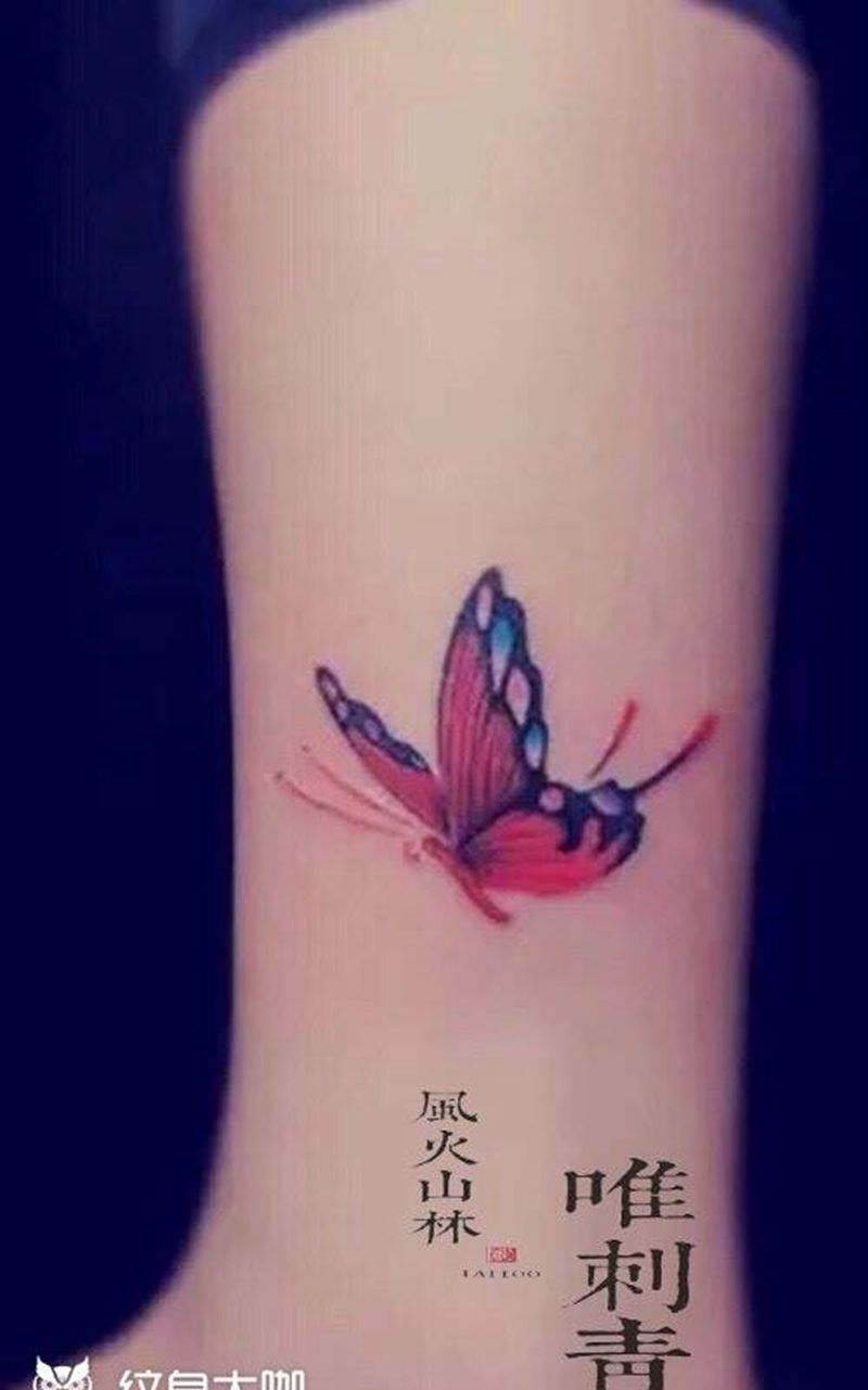 彩蝶纹身图片_成品腿部清新动物时尚元素纹身图案
