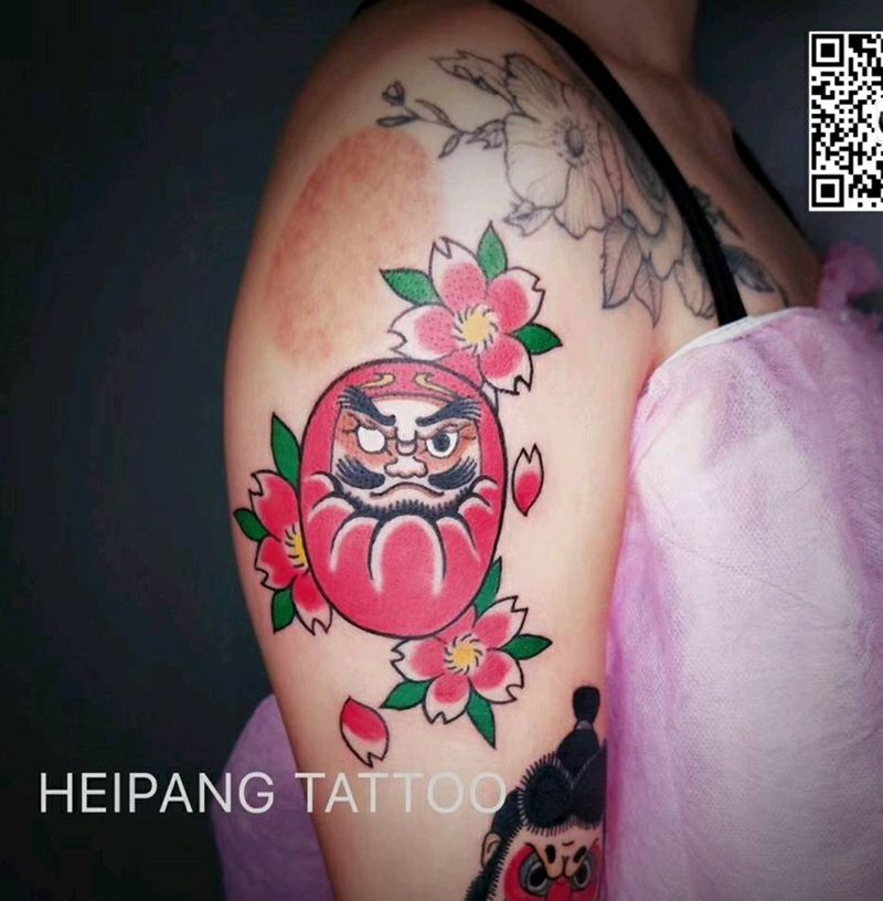 达摩蛋纹身图片_手臂纹身图案