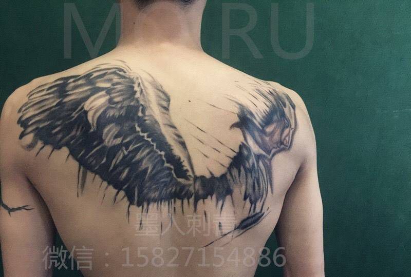 恢复后的翅膀纹身图片