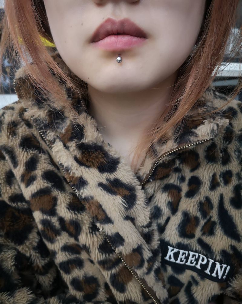 近期穿孔纹身图片_穿孔唇钉舌钉纹身图案