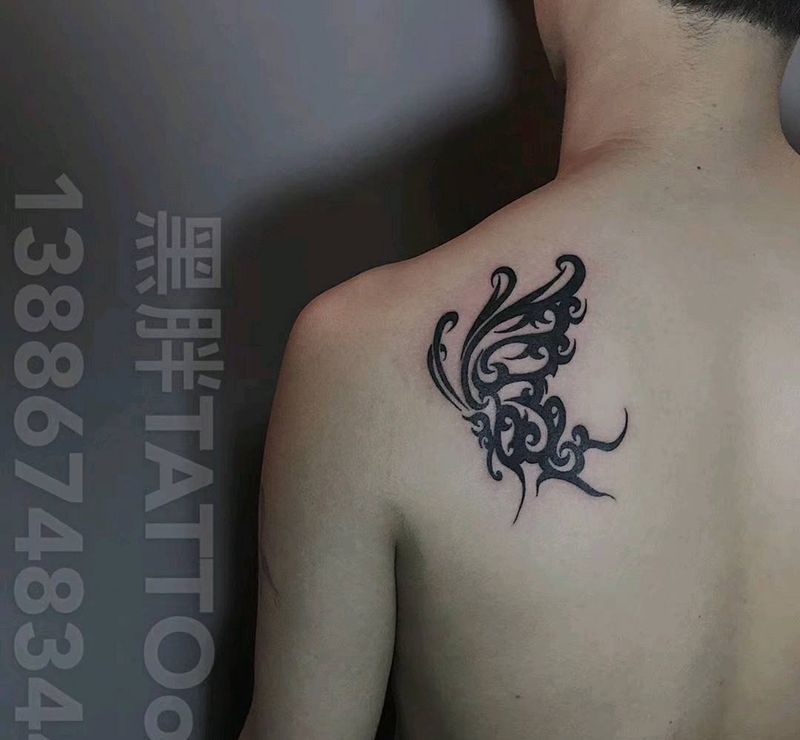 蝴蝶图腾纹身图片