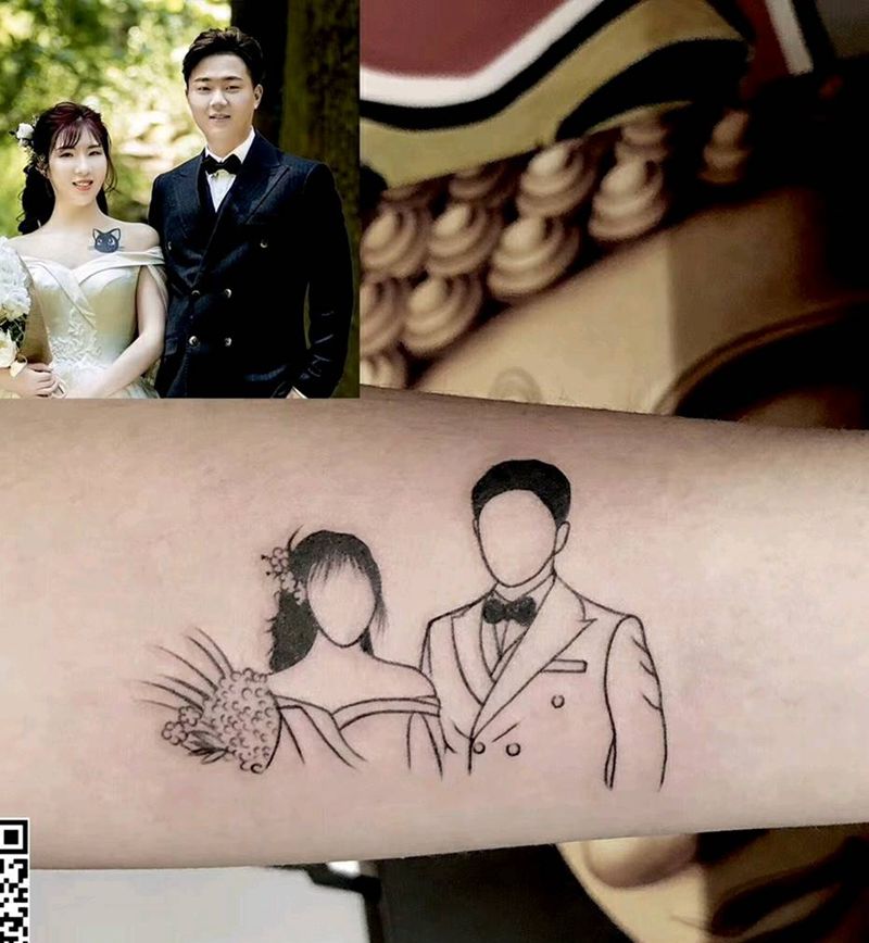 照片纹身图片_手臂纹身图案
