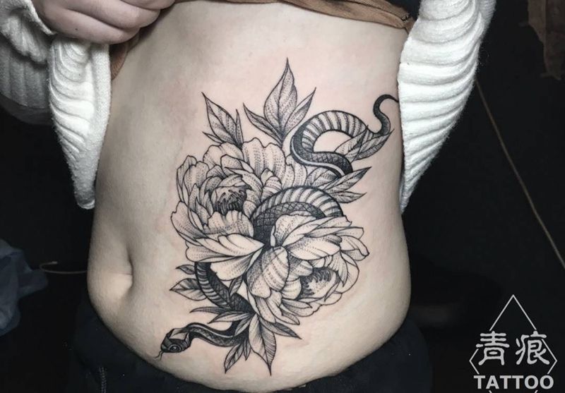 花与蛇纹身图片