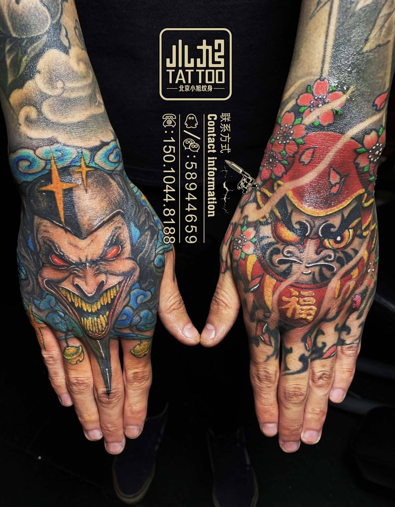 达摩、小丑纹身图片_手部新传统欧美写实达摩小丑纹身图案