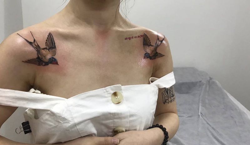 燕纹身图片_胸部纹身图案