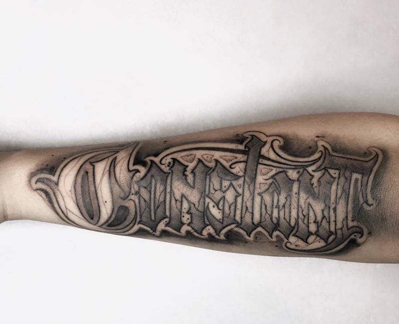 硬花纹身图片_手臂花体字纹身图案