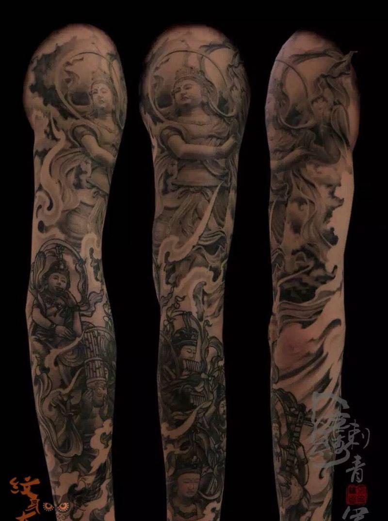 花臂纹身图片_传统写实人物宗教手部手臂纹身图案