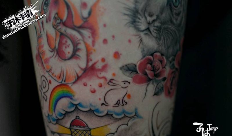 陆陆续续 各个小图拼贴 填满了纹身图片_腿部纹身图案