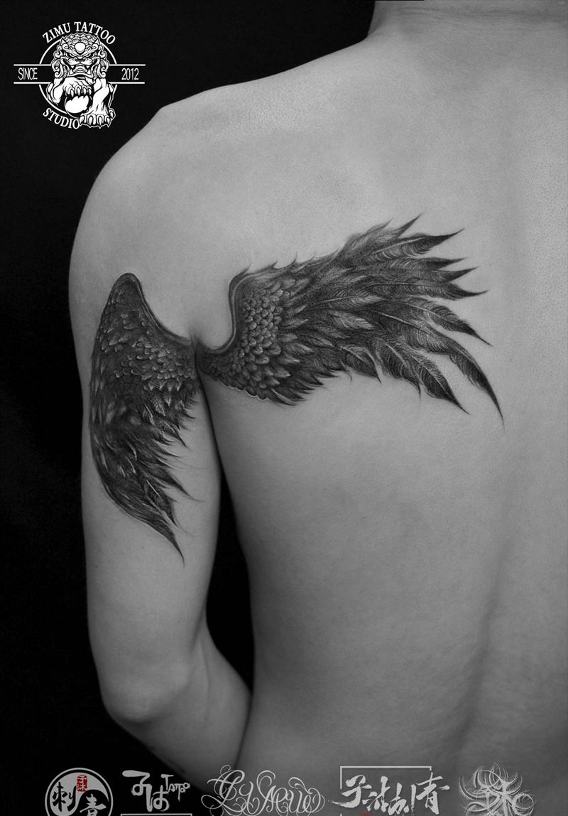 遮盖翅膀后背大臂纹身图片_背部手臂欧美写实新传统纹身图案