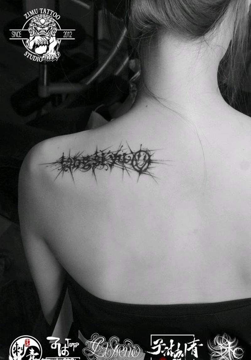 遮盖文字线条抽象纹身图片_几何纹身图案