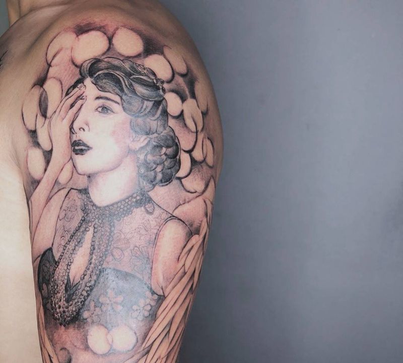 艺术照纹身图片_手臂欧美写实纹身图案