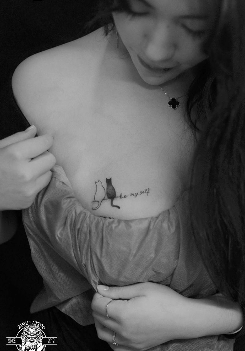 疤痕遮盖胸口纹身猫咪纹身图片_几何纹身图案