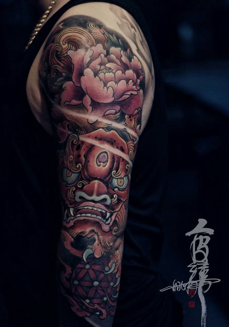 唐狮牡丹七分袖花臂纹身图片_手臂手部传统鬼神宗教植物纹身图案