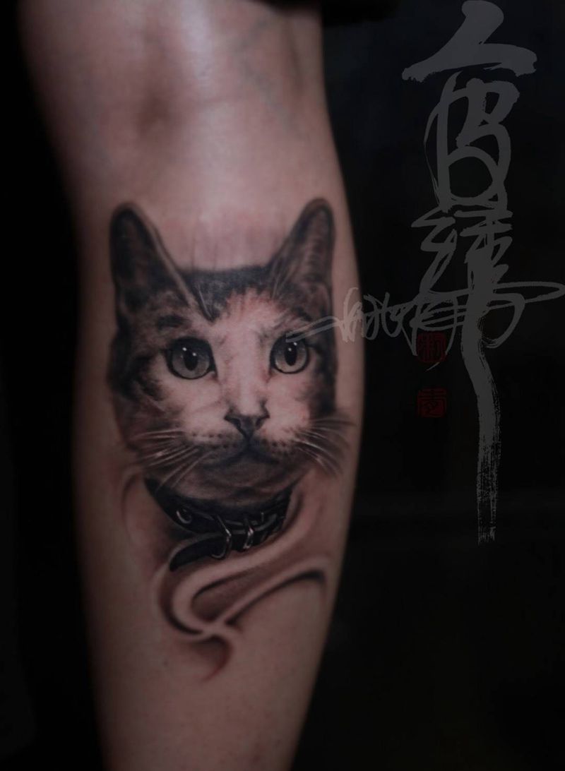 这个猫咪叫美丽纹身图片_欧美肖像写实动物腿部纹身图案