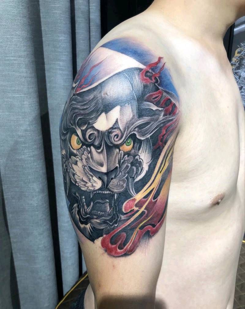 唐狮子纹身图片_手臂老传统新传统纹身图案