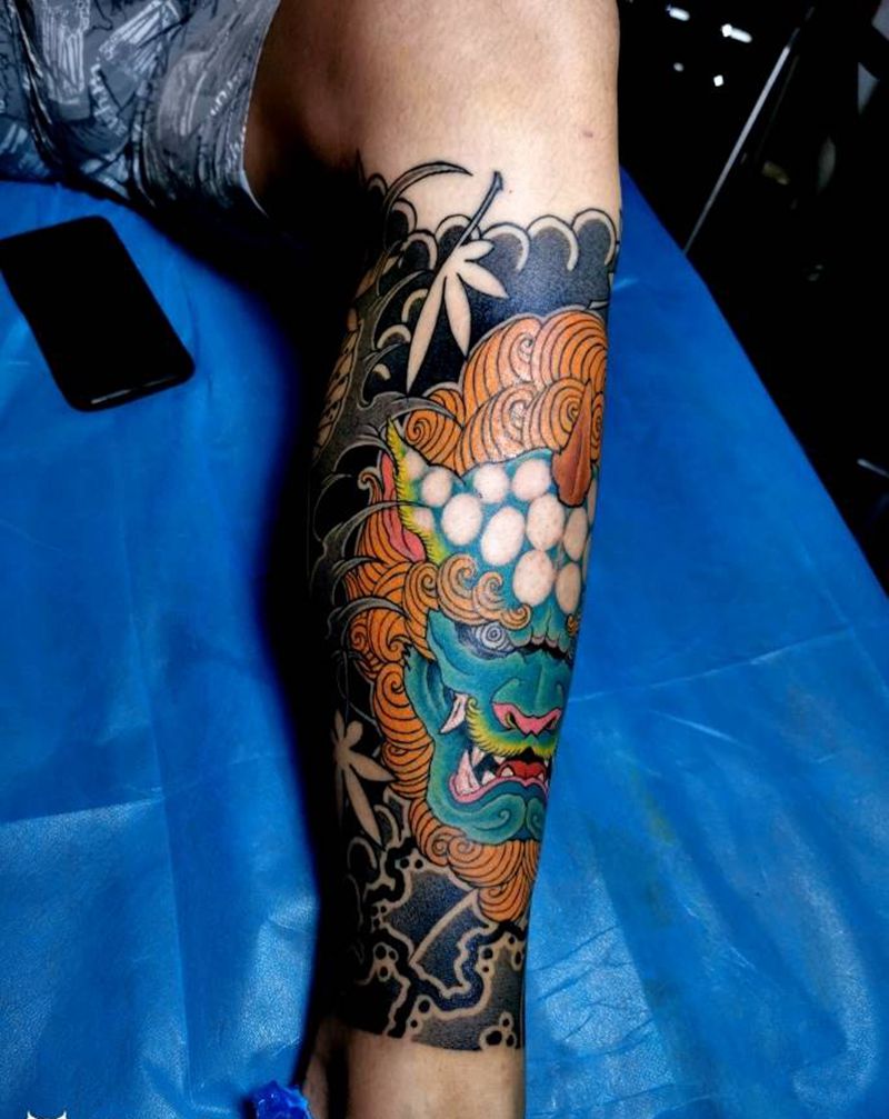 唐西几纹身图片_腿部老传统唐狮纹身图案