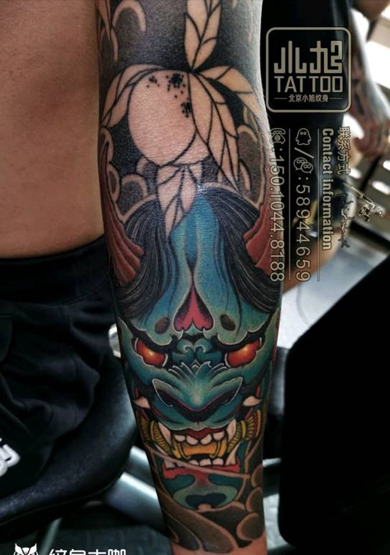 花臂上彩纹身图片_手臂老传统般若达摩桃子纹身图案