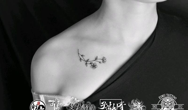 锁骨的小花纹身图片_几何纹身图案