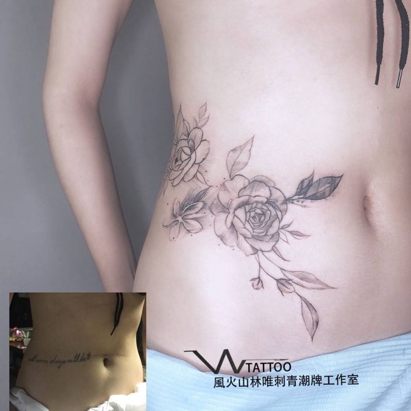 遮盖纹身图片_腰部花纹身图案