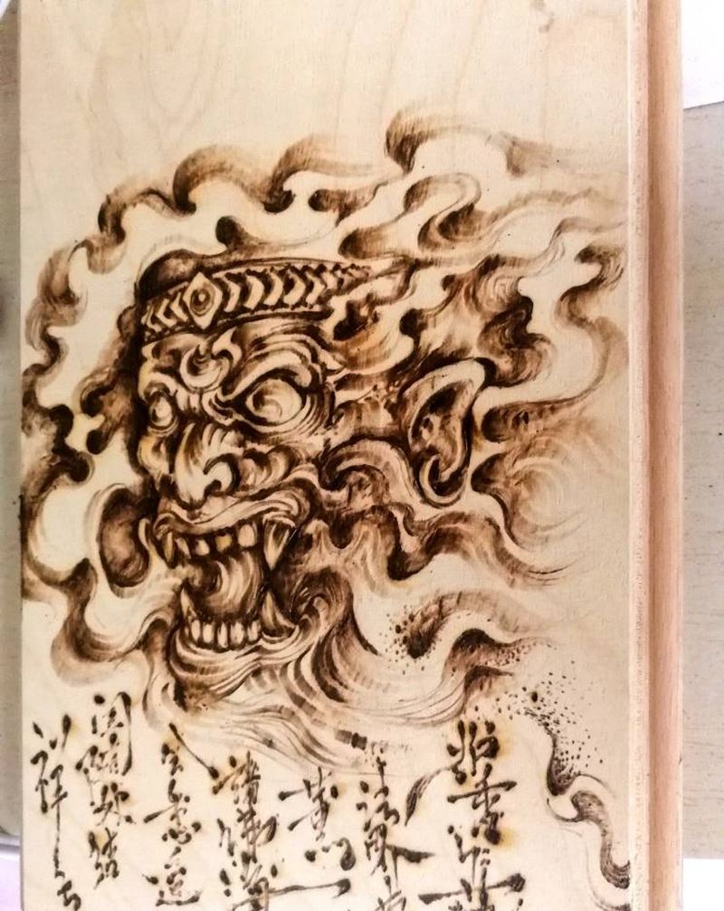 给木板扎刺青.烫手的电烙笔纹身图片_新传统纹身图案