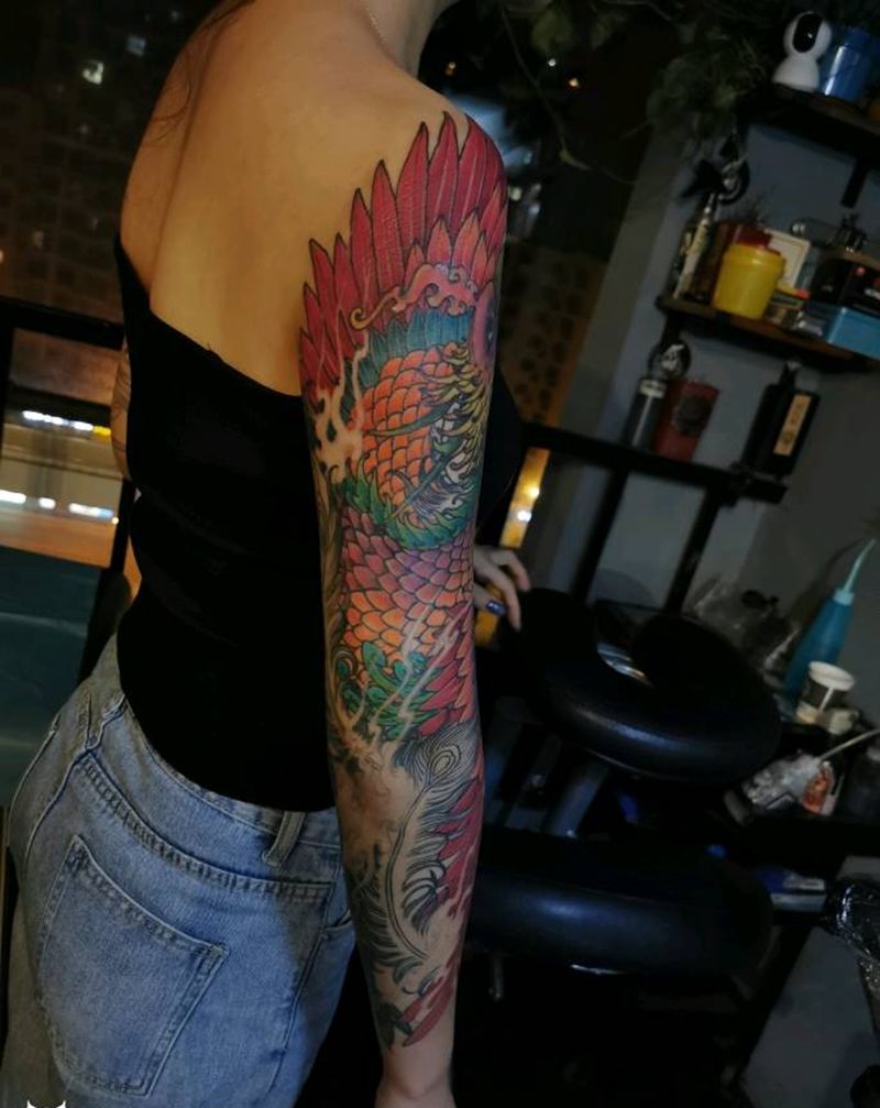 凤凰花臂纹身图片_肩部手臂新传统凤凰纹身图案