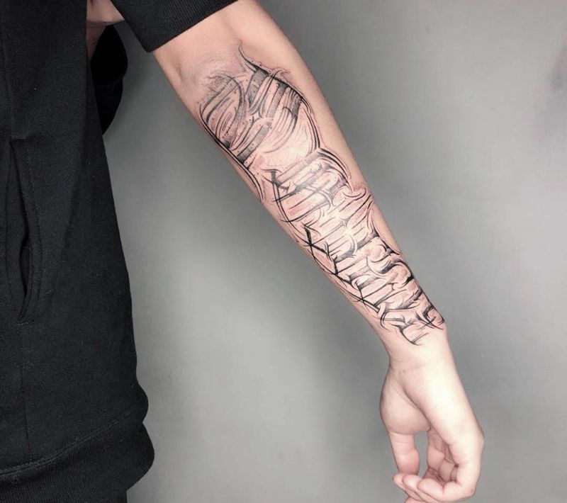 暗黑花体字纹身图片_手臂纹身图案