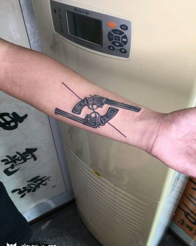 打枪纹身图片