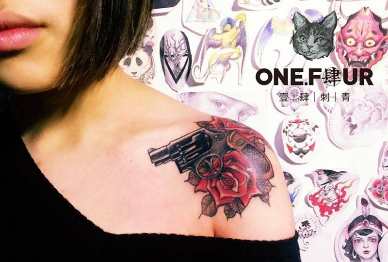 枪花纹身图片