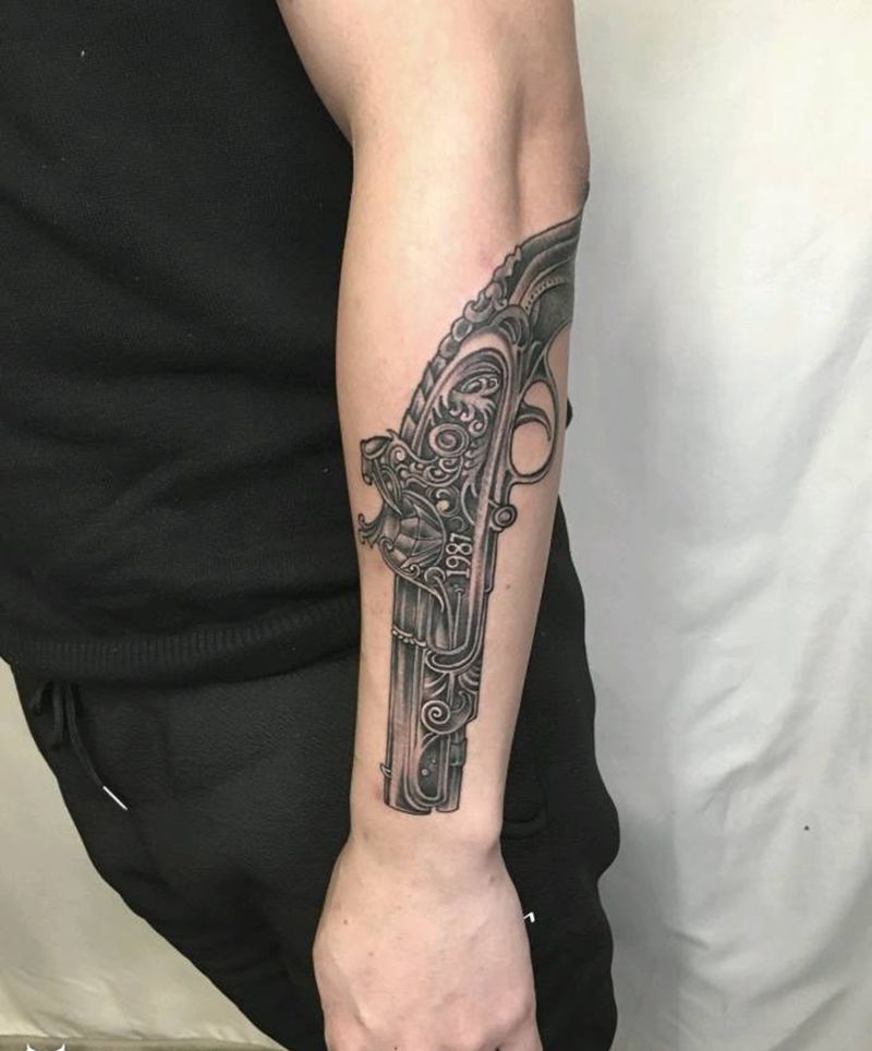 手枪纹身图片_手部纹身图案