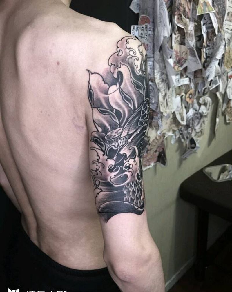 鱼莲花纹身图片