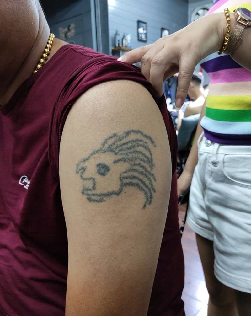 狮子，遮盖纹身图片_手臂肩部纹身图案