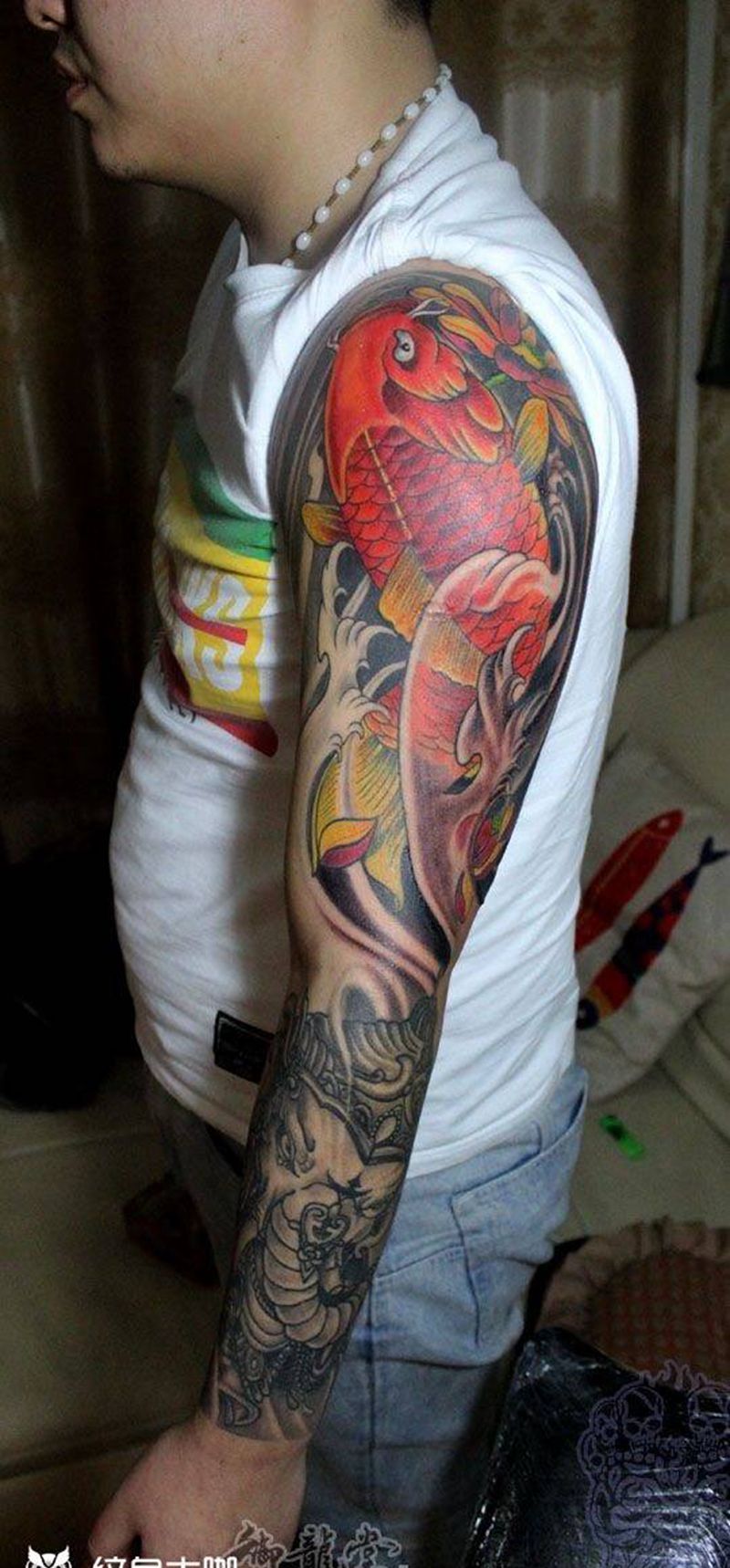 象神鲤鱼素材纹身图片_传统手臂成品纹身图案